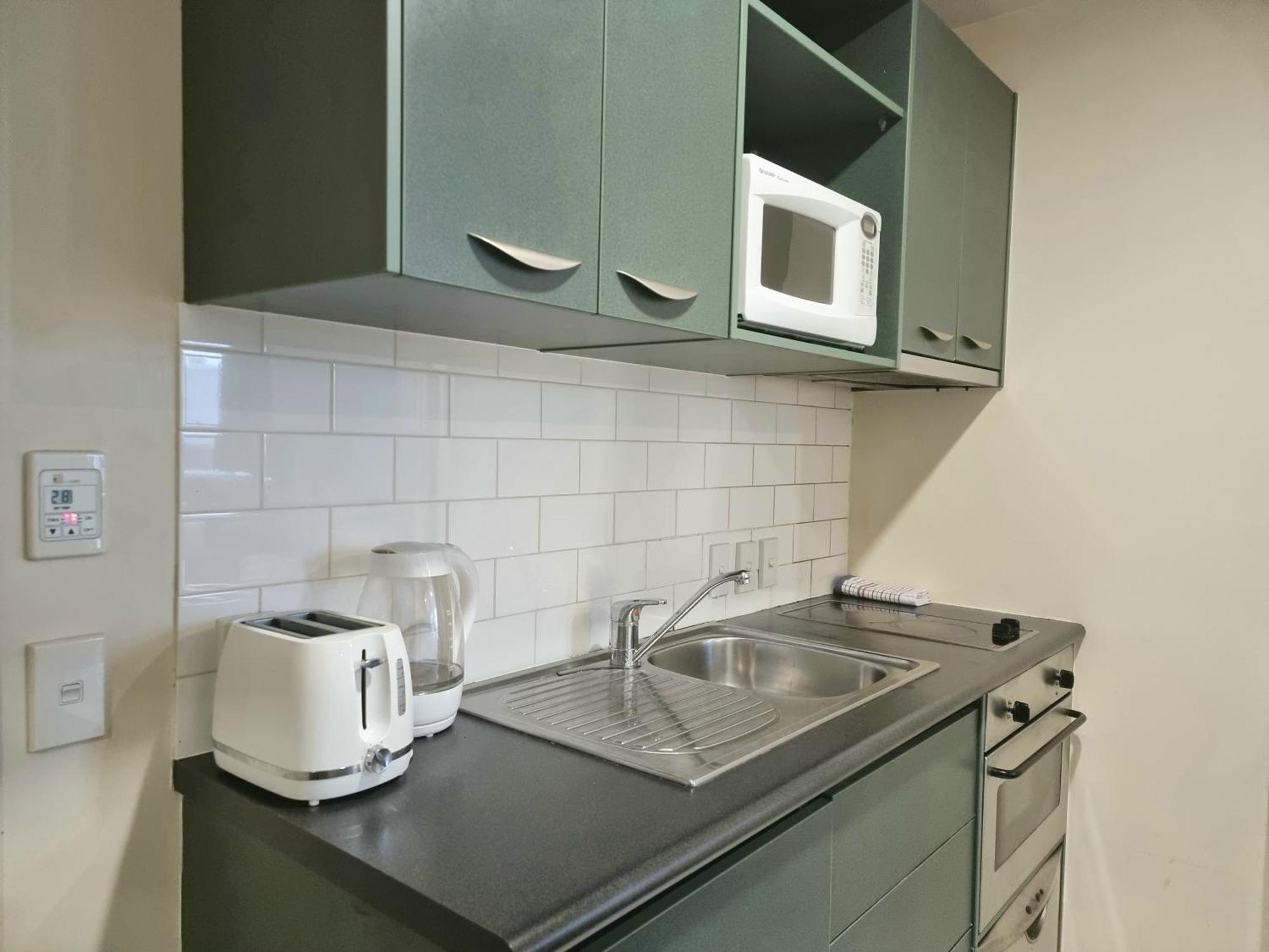 Urban Deco Apartment On Queen Street オークランド 部屋 写真